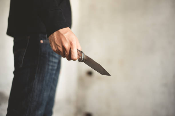 คนถือมีด